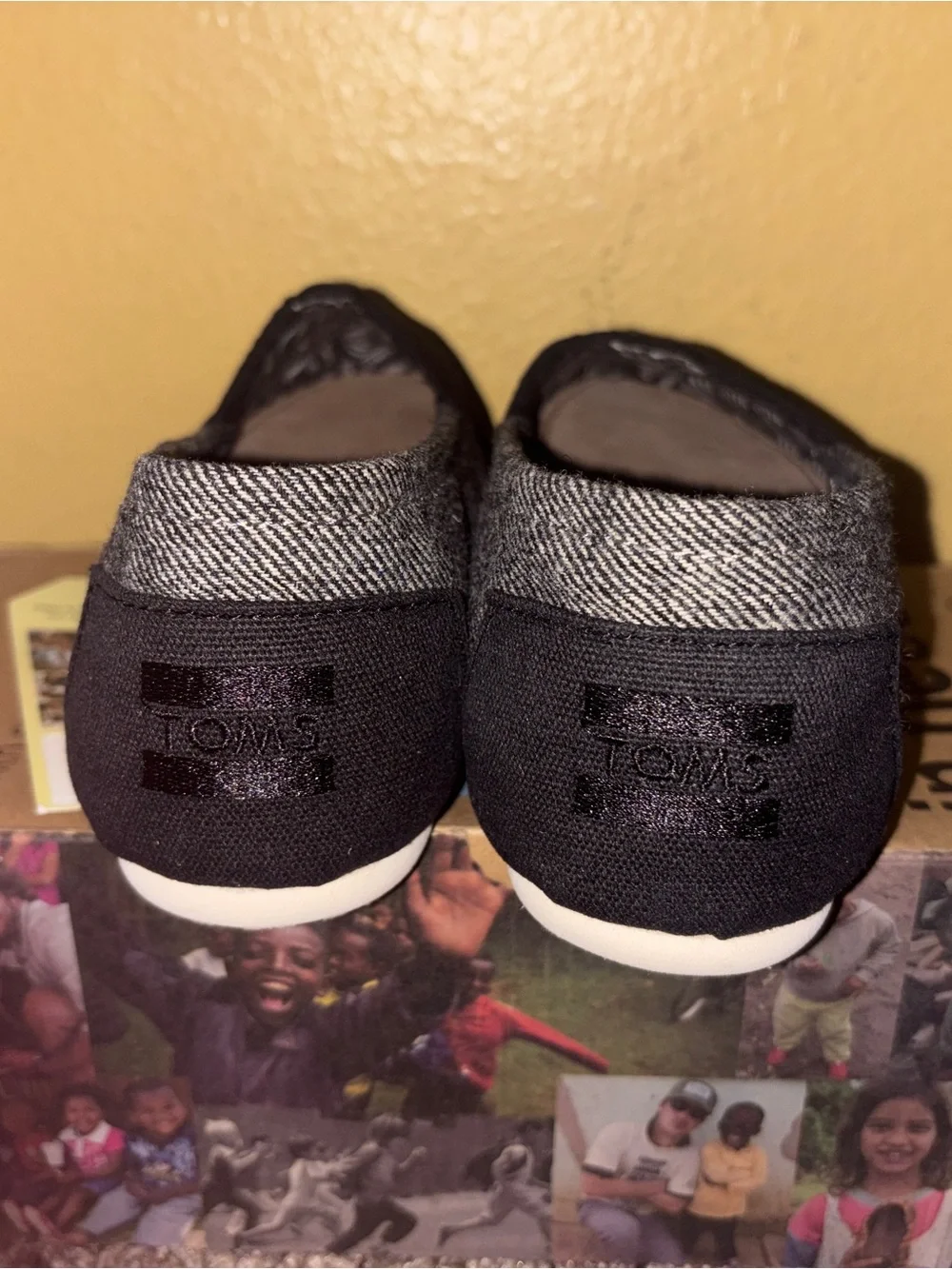 Toms Kids Black Canvas Slip-On Sneakers with Patterned Lining